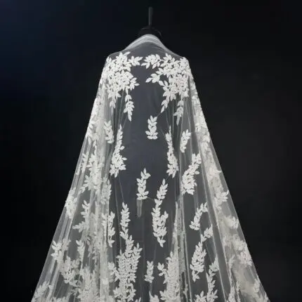 Off White Tulle with embroidered leaves and delicate beads.