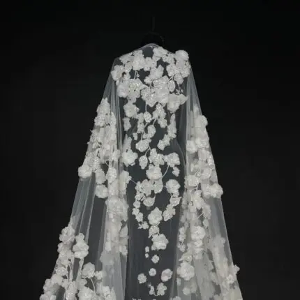 Off White Tulle with embroidery, 3D flowers, and sequins.