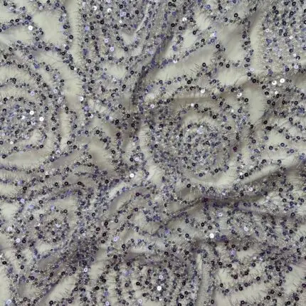 Tulle with single cord detail and sequins.